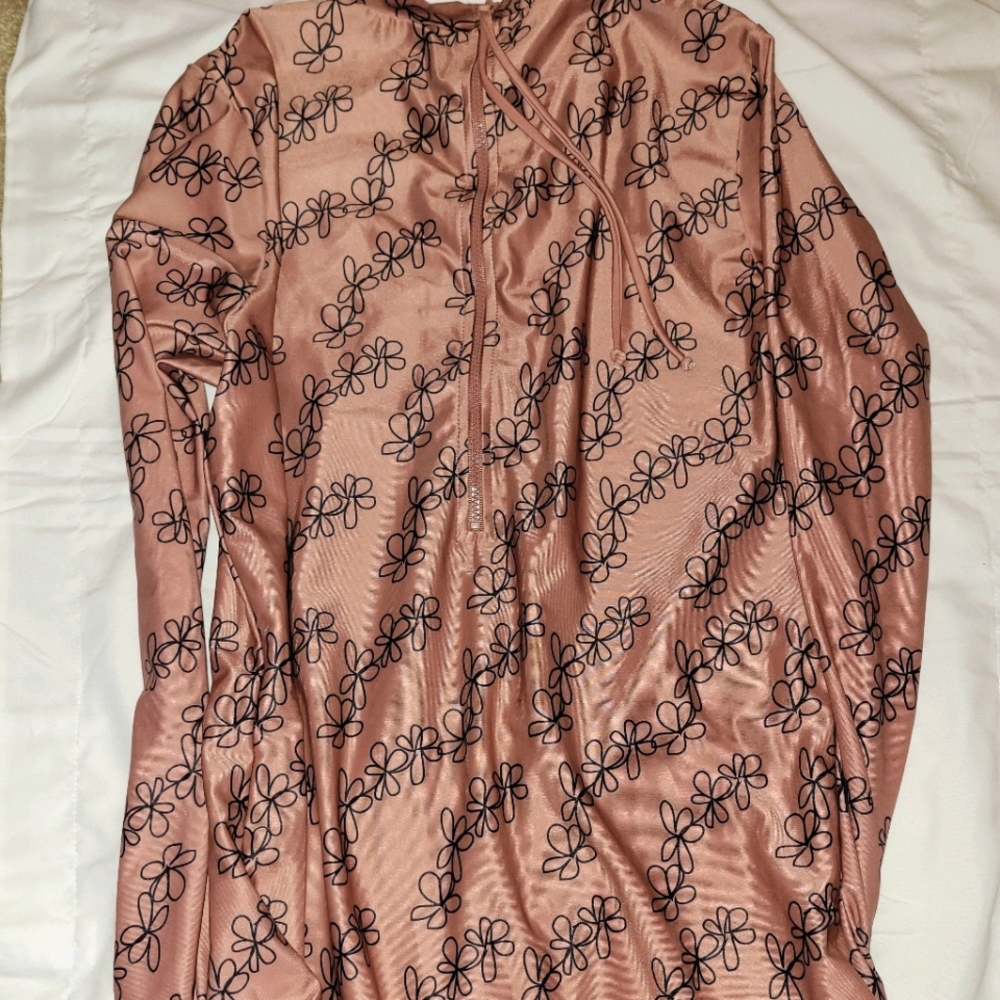 One piece long sleeved bathing suit